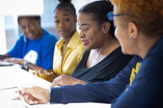 A group of four students in a study session